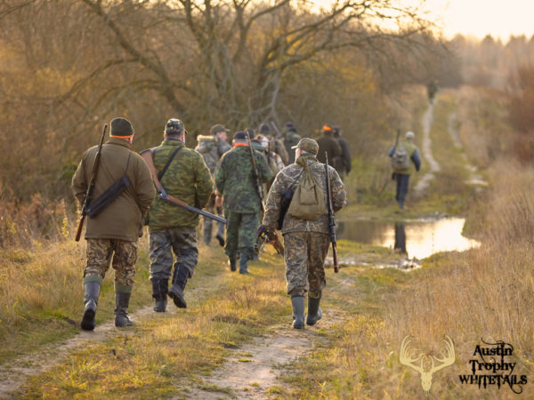 Group of friends during hunting season at the Austin Trophy Whitetails ranch. 